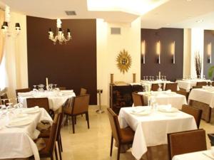 Habitaciones del Hotel Asador H.M. Versus