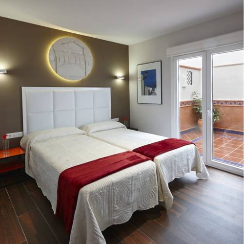 Apartamentos Caballerizas Granada con parking gratuito en pleno centro