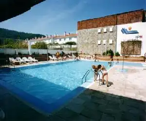 Hotel Sarga - hotel en Cabañas